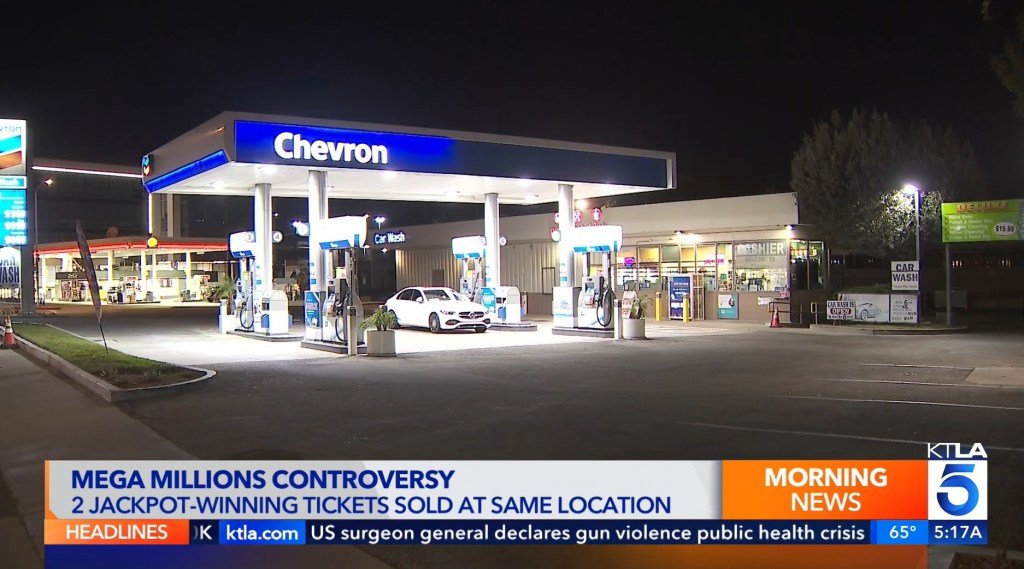 Mega Millions jackpot winner claims he purchased both 394M prize